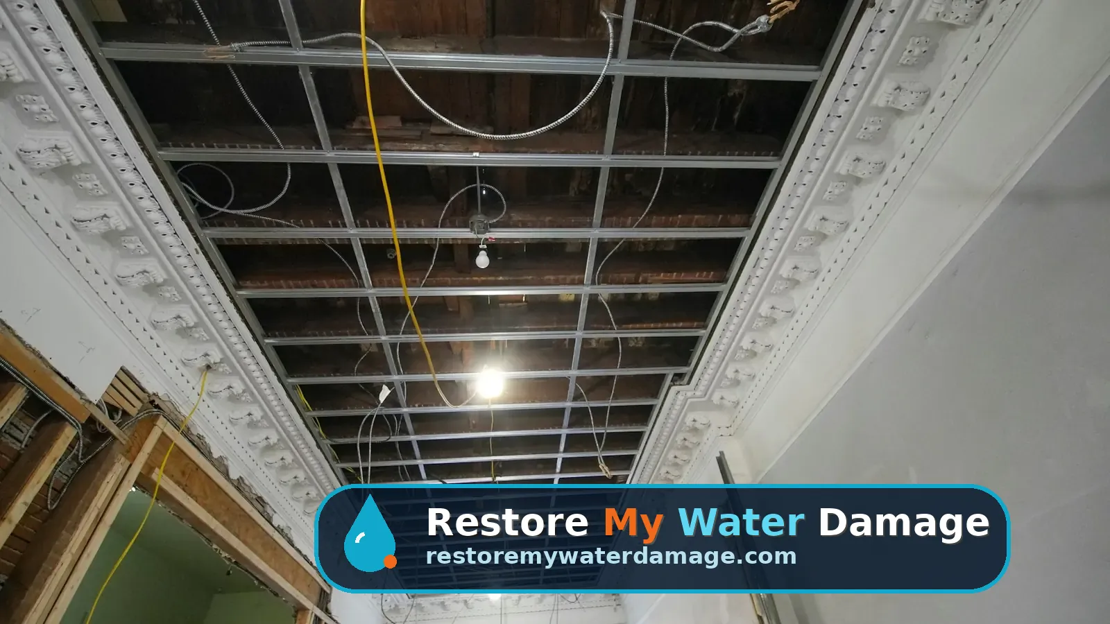 Interior ceiling opened down to its framing during repairs, a stage of water damage restoration Plano Richardson, TX